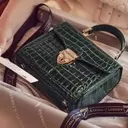 Classic vs. Trendy: Which Aspinal Handbag Should You Choose?