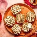 Delectable Gingerbread Muffins with Streusel Topping and Cream Cheese Glaze