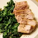 Quick One-Pan Garlic-Butter Pork Chops with Sautéed Spinach