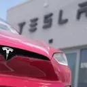 Tesla's Shifting Strategy: From EV Leader to AI and Robotics Pioneer Amidst Profit Slump