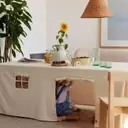 Crafting Whimsical Worlds: The DIY Tablecloth Playhouse