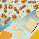 Nuts or Cheese: The Optimal Mediterranean Snack Choice?