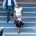 Michelle Obama Redefines Professional Attire with Chic Slip Skirt Ensemble