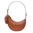 The Rise of Kate Spade's Duo Bags: A Celebrity Favorite