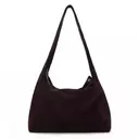 The Allure of Brown Suede: Elevate Your Style with These Handbag Picks