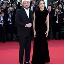 John Travolta's Cannes Style Evolution: From Acting Icon to Beret-Clad Director