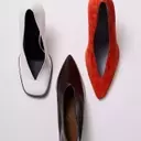 Spring 2024: Embrace Eccentric Footwear with Bold New Trends