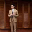 The Enduring Elegance of the Khaki Suit for Summer Weddings