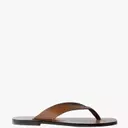 The Enduring Appeal of Thong Sandals: A Summer Style Essential