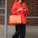 Jennifer Lawrence Embraces Bold Hues: A Summer Style Statement