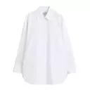 The Versatile White Button-Down: A Style Essential