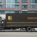 UPS Shares Gain Momentum Amidst Contract Scrutiny and Strategic Expansion
