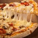 Domino's Pizza Exceeds Revenue Estimates Despite Earnings Miss in Q2