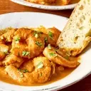 A Culinary Exploration of Shrimp and Chorizo in a Velvety Tomato Sauce