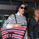 Dua Lipa Redefines Airport Chic with Oversized Chanel Tote