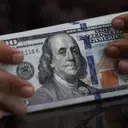 US Dollar Remains Steady Amidst Dovish Federal Reserve Expectations and Global Inflation Concerns