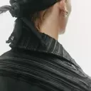 The Resurgence of Men's Dangling Earrings on the Runway