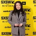 Vivian Tu's Financial Advice: Prioritizing Debt Repayment Over Investing