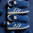 Adidas Revives Billie Jean King's Iconic Blue Suede Tennis Shoes