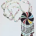 Beaded Narratives: Ken Williams Jr.'s Artistry and Indigenous Heritage