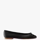 Celebrity-Approved Black Flats: A Style Guide