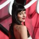 Dakota Johnson Revives Precision Red Lip at "Verity" Premiere