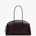 DeMellier Launches 'Icons' Collection: A Star-Studded Collaboration of Timeless Handbags