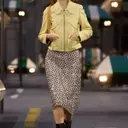 The Ultimate Footwear Guide for Midi Skirts: Enhancing Your Style
