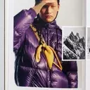 Moncler Group's Mixed Q3 Performance: Moncler Flatlines, Stone Island Surges