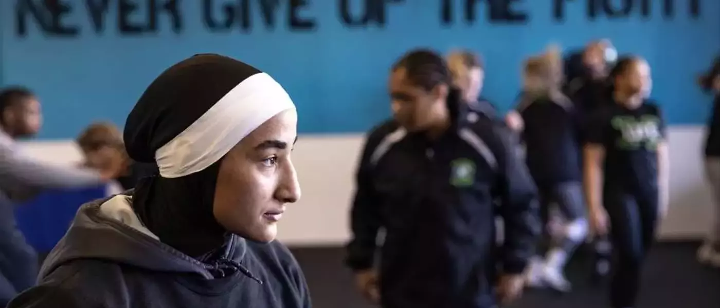 Sisters Revolutionize Women's Wrestling with Faith-Based Uniforms