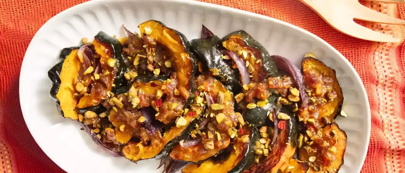 Culinary Harmony: Roasted Acorn Squash with Caramelized Red Onions and Honey-Date Vinaigrette