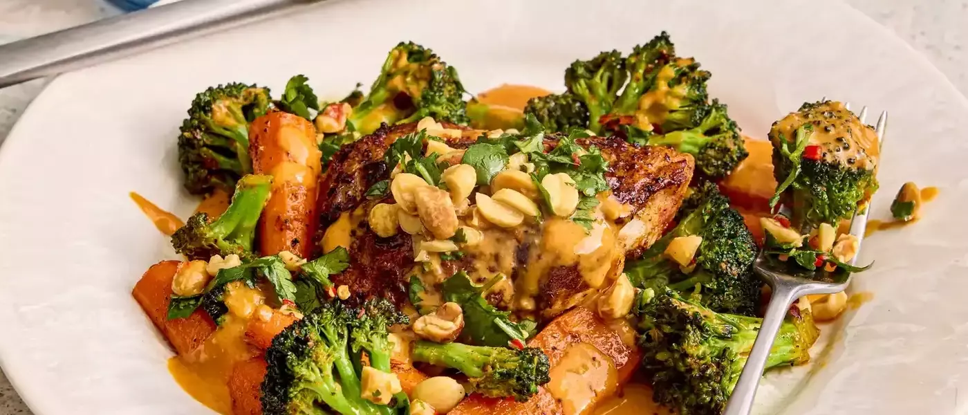 Sheet-Pan Thai Red Curry Chicken with Peanut-Lime Sauce: A Flavorful Weeknight Meal