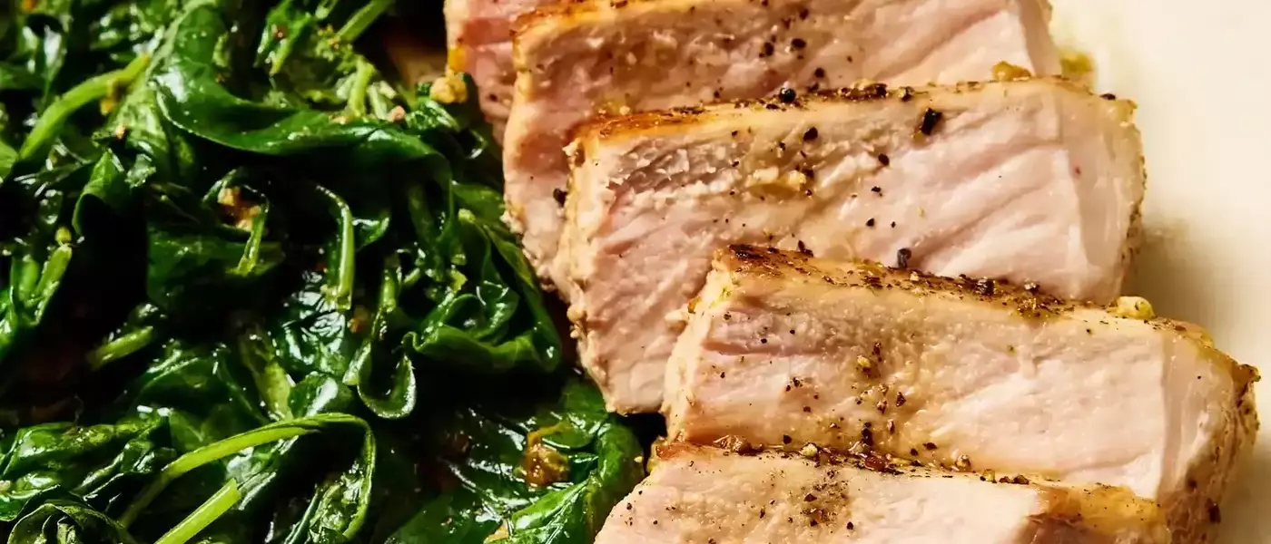 Quick One-Pan Garlic-Butter Pork Chops with Sautéed Spinach