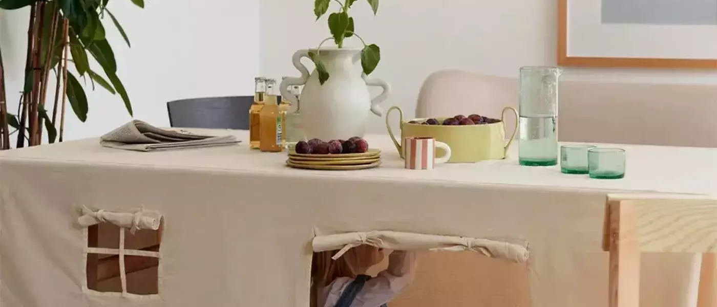 Crafting Whimsical Worlds: The DIY Tablecloth Playhouse