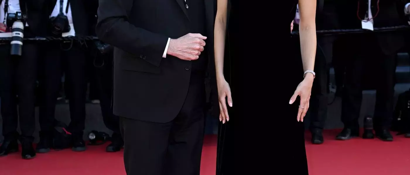 John Travolta's Cannes Style Evolution: From Acting Icon to Beret-Clad Director