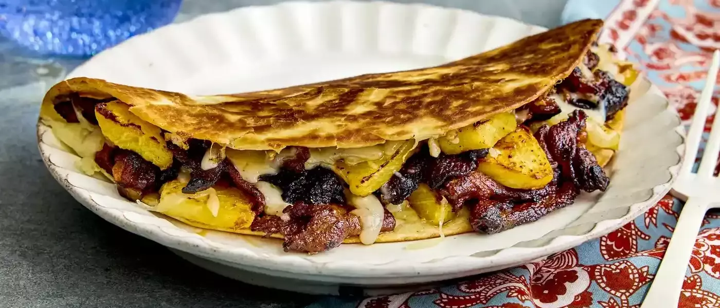 The Art of Crafting Homemade Al Pastor Quesadillas
