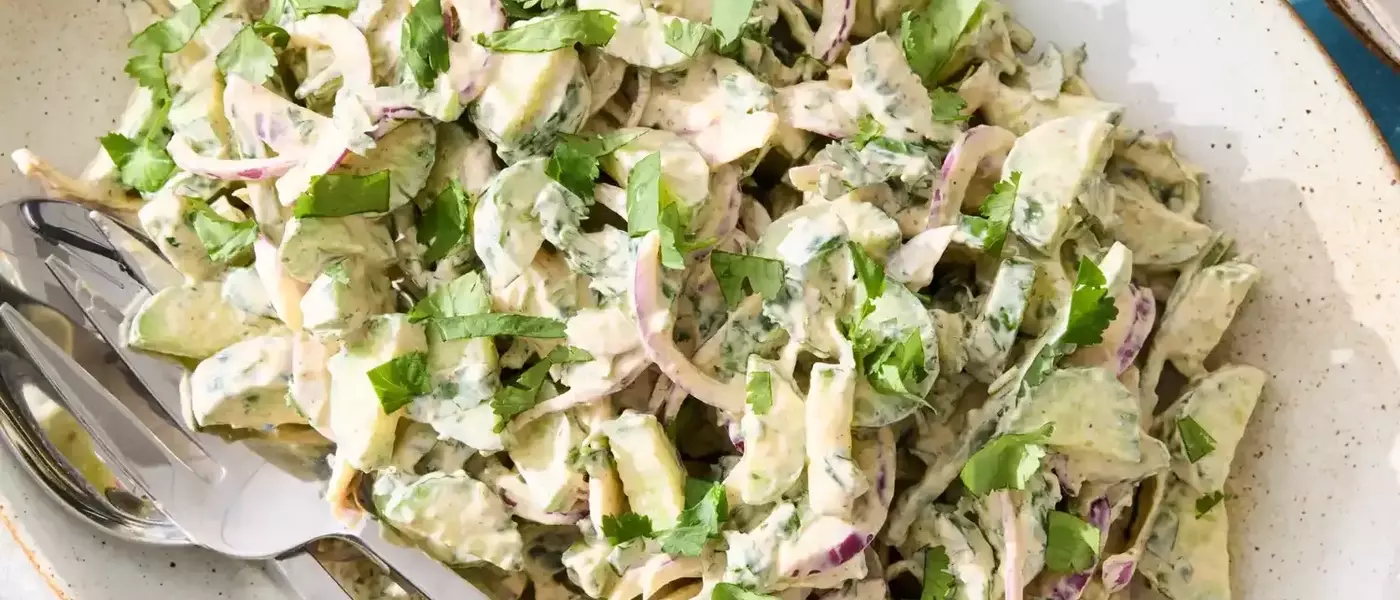 Refreshing Cucumber Salad with Spicy Yogurt Dressing: A Culinary Journey from Childhood Snacks