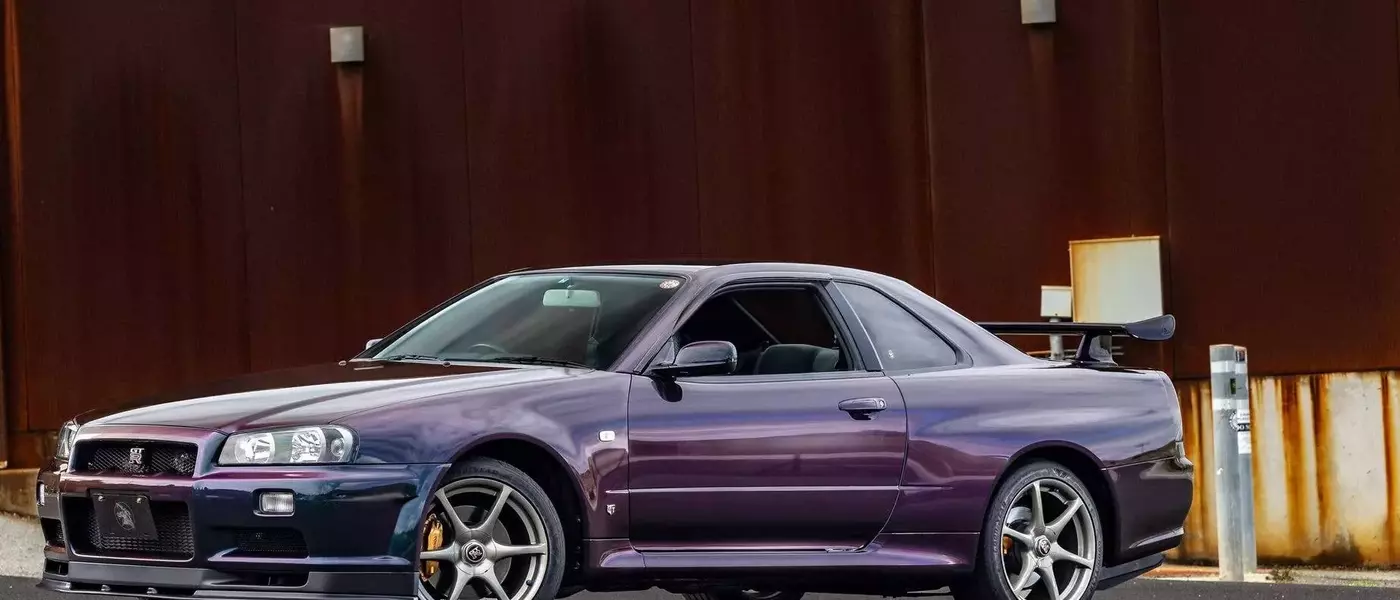 Rare 1999 Nissan Skyline GT-R V-Spec in Midnight Purple with Low Mileage Heads to Auction
