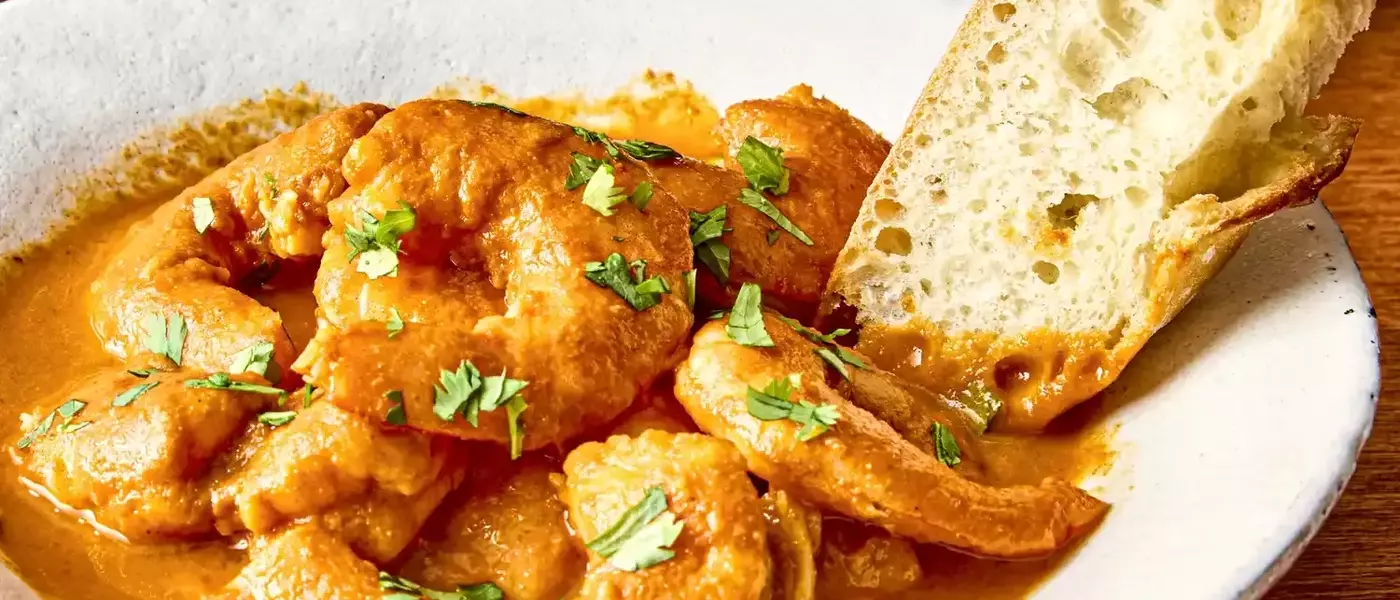 A Culinary Exploration of Shrimp and Chorizo in a Velvety Tomato Sauce