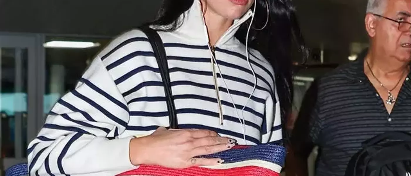Dua Lipa Redefines Airport Chic with Oversized Chanel Tote