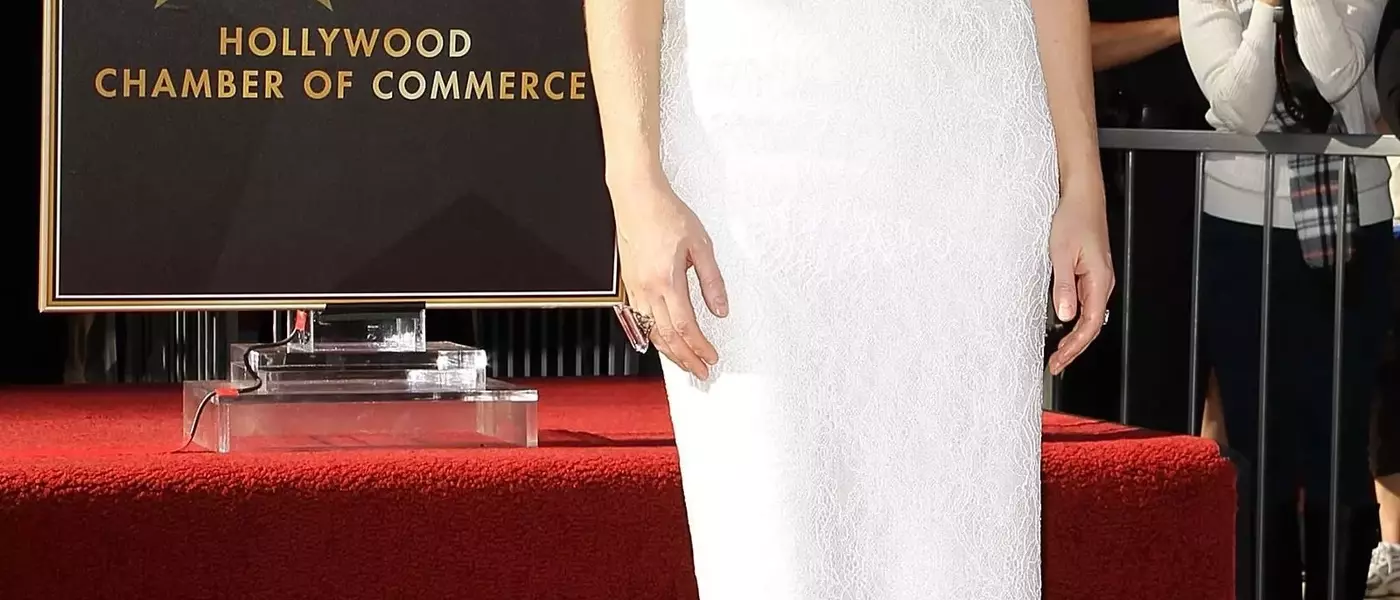 Apple Martin Embraces Mother Gwyneth Paltrow's Timeless Style with a Classic White Dress