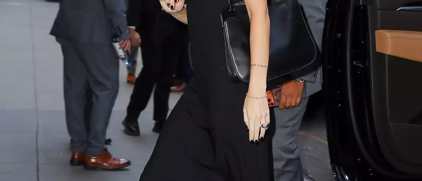 Dakota Johnson's Unexpected Summer Footwear Choice: The Wedge Flip-Flop
